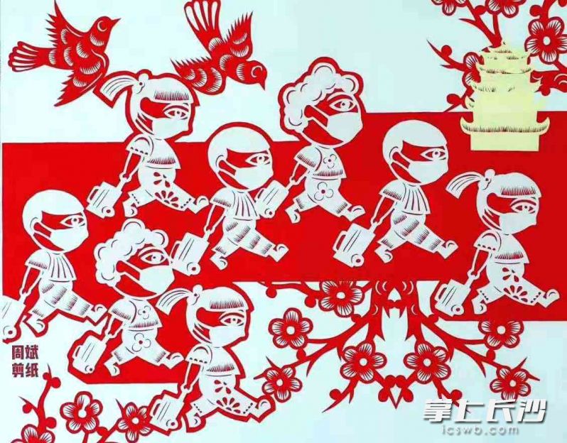 周斌去年创作的抗疫剪纸作品《最可爱的人》，荣获了“大爱无疆”北京·渭南全国抗疫剪纸精品展银奖。