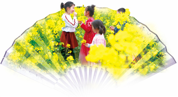 油菜花海里，来自宁乡城区的小朋友们在尽情赏花，享受快乐时光。段华良 摄